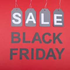 Black Friday sale sign with shopping bags