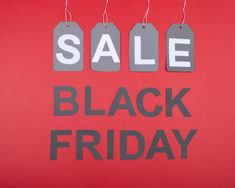 Black Friday sale sign with shopping bags