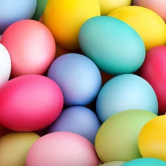 Stack of brightly coloured decorated Easter eggs