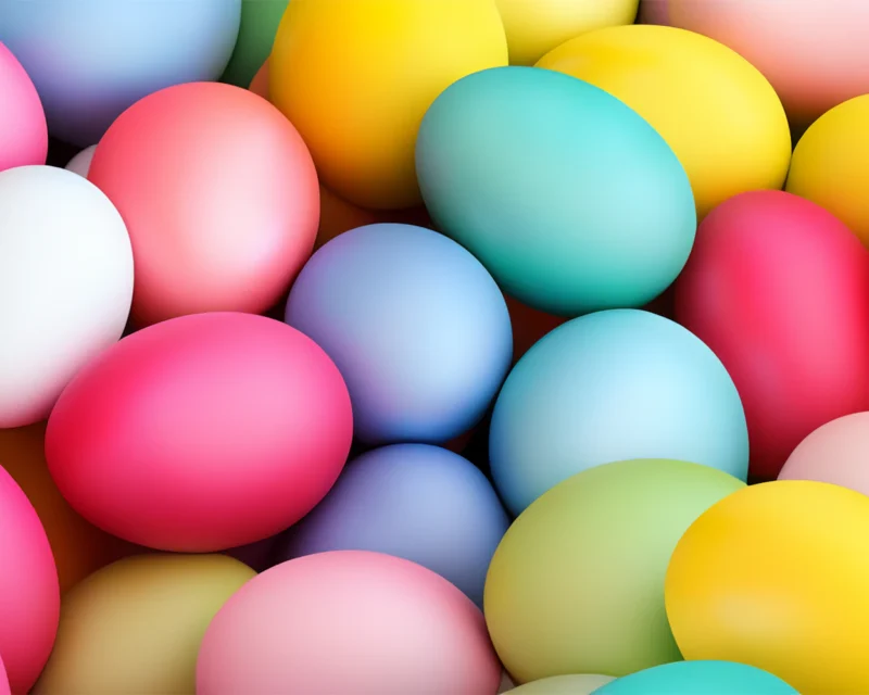 Stack of brightly coloured decorated Easter eggs