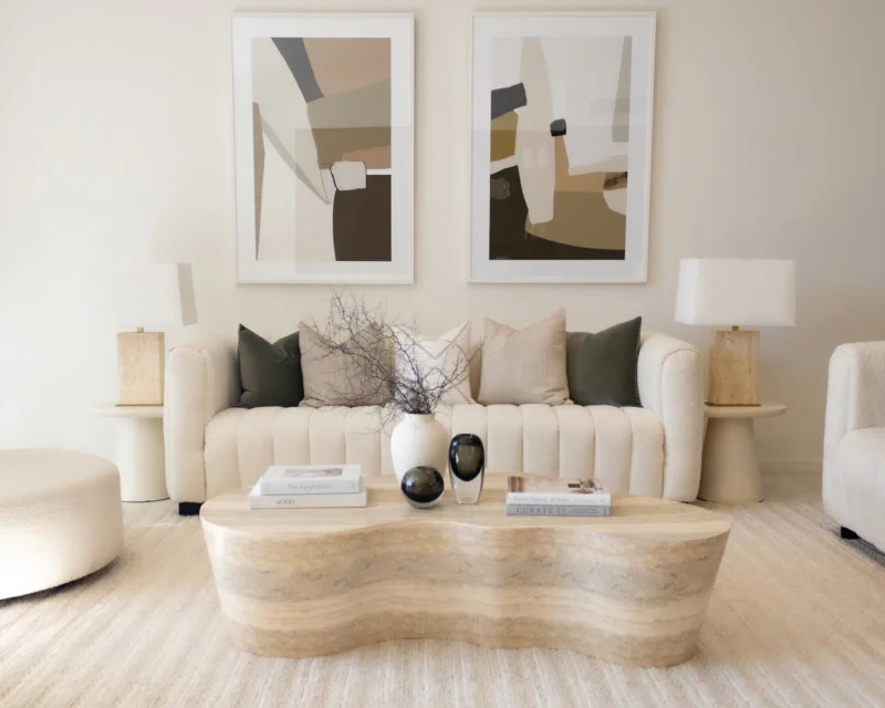 Neutral modern living room with a styled coffee table
