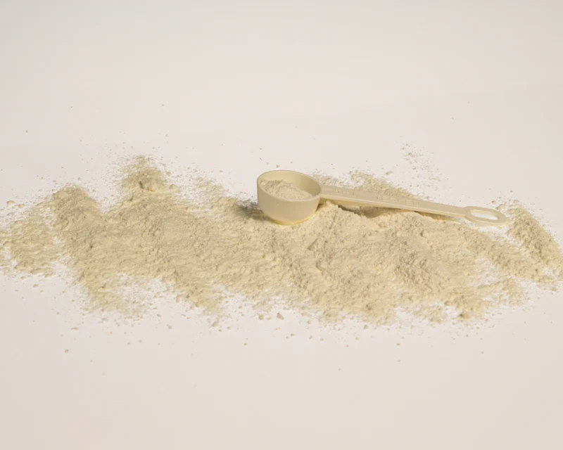 Close-up of fiber supplement powder with a scoop