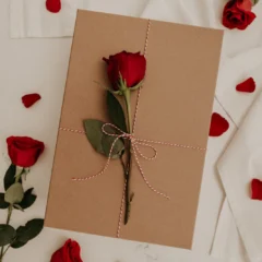 Gift box filled with red roses for Valentine's Day